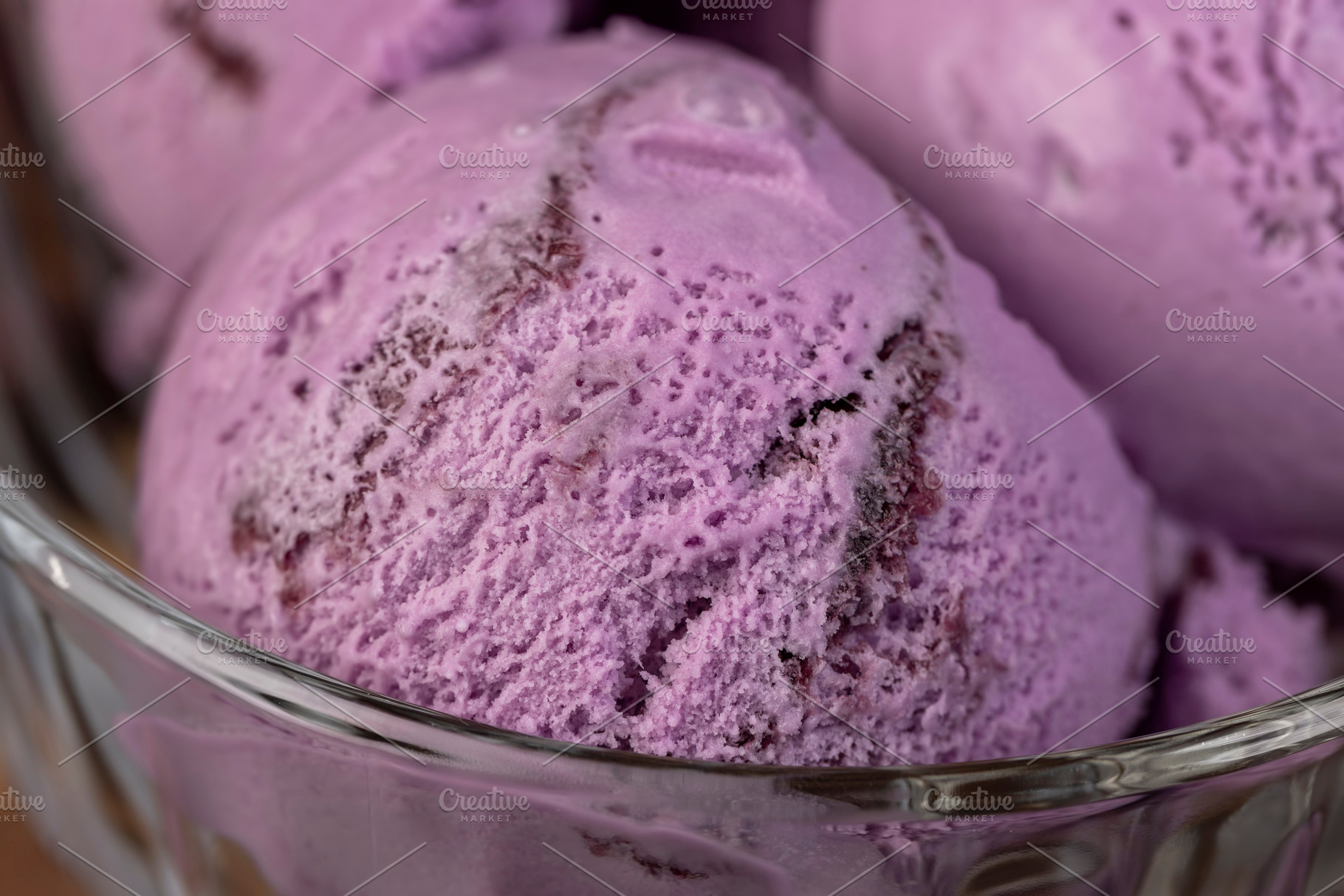 ice cream with blueberry flavor, blueberry ice cream balls, a Photo by rsoollAI