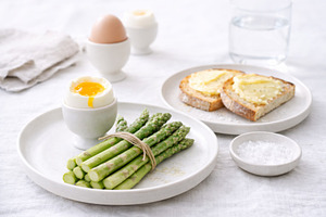 Asparagus and soft-boiled egg breakf, a Photo by Dvoevnore photos