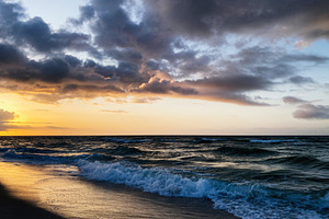 Stunning Florida sunset over the ocean with waves crashing on the sandy Pensaco, a Nature Photo by AS photostudio