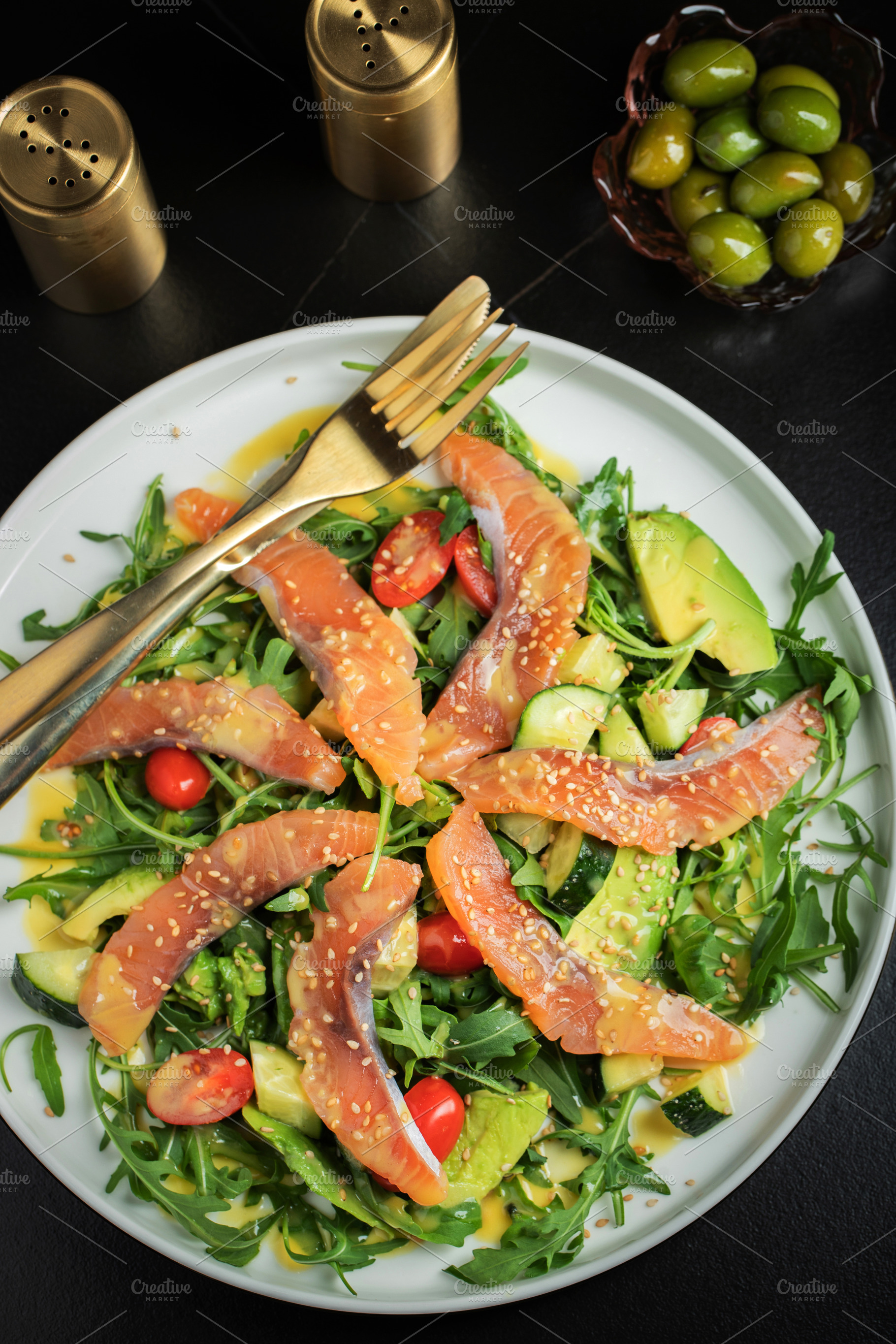 Salad with salted salmon and arugula, a Food & Drink Photo by Budarinphoto