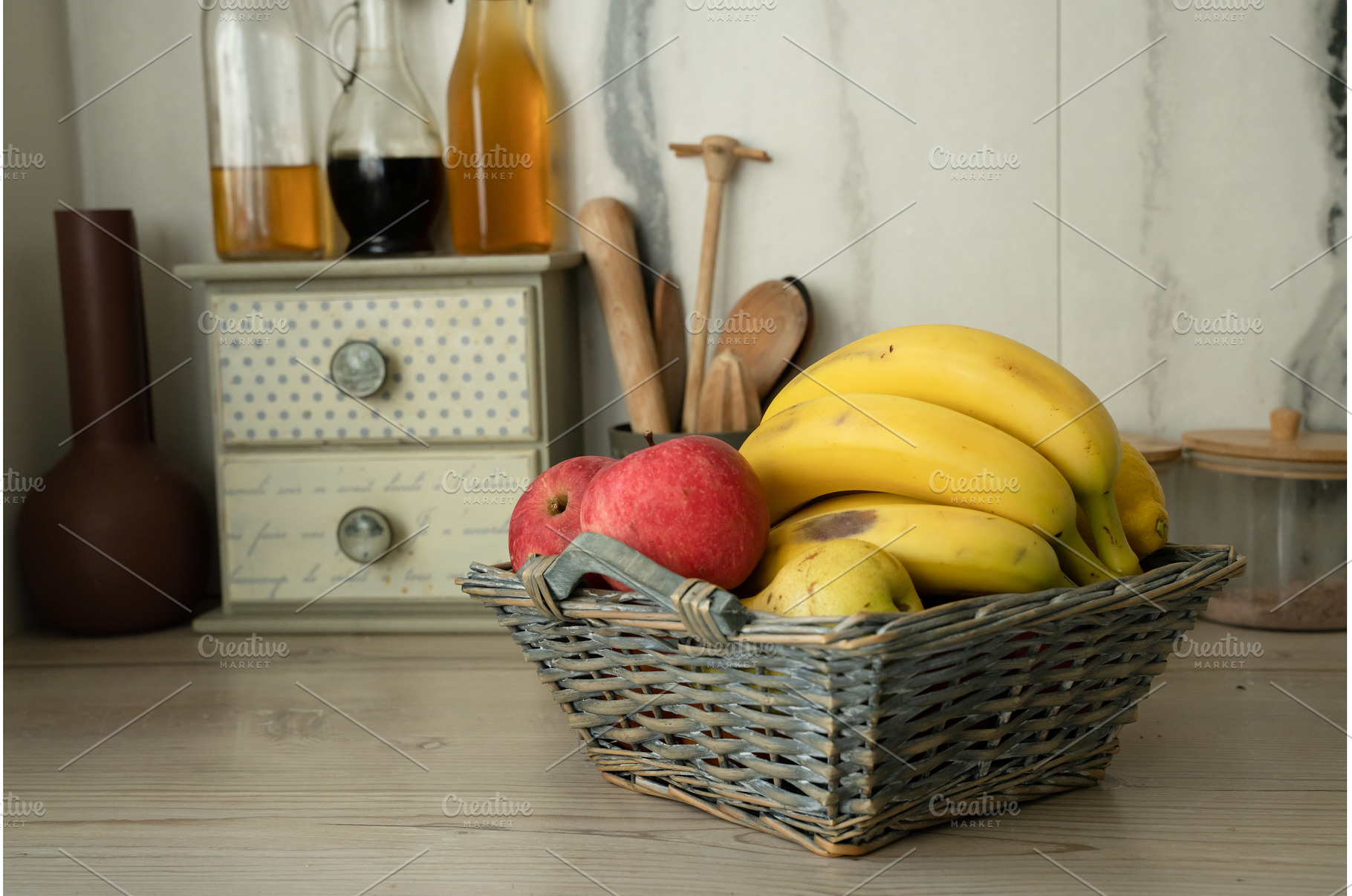 Basket with fresh fruits on table in, a Food & Drink Photo by oksix