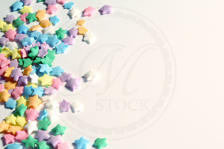Pastel stars containing stars, candy, and kids