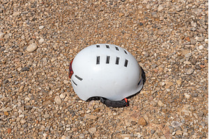 A white helmet on the orange and, a Technology Photo by Illustrations&photos