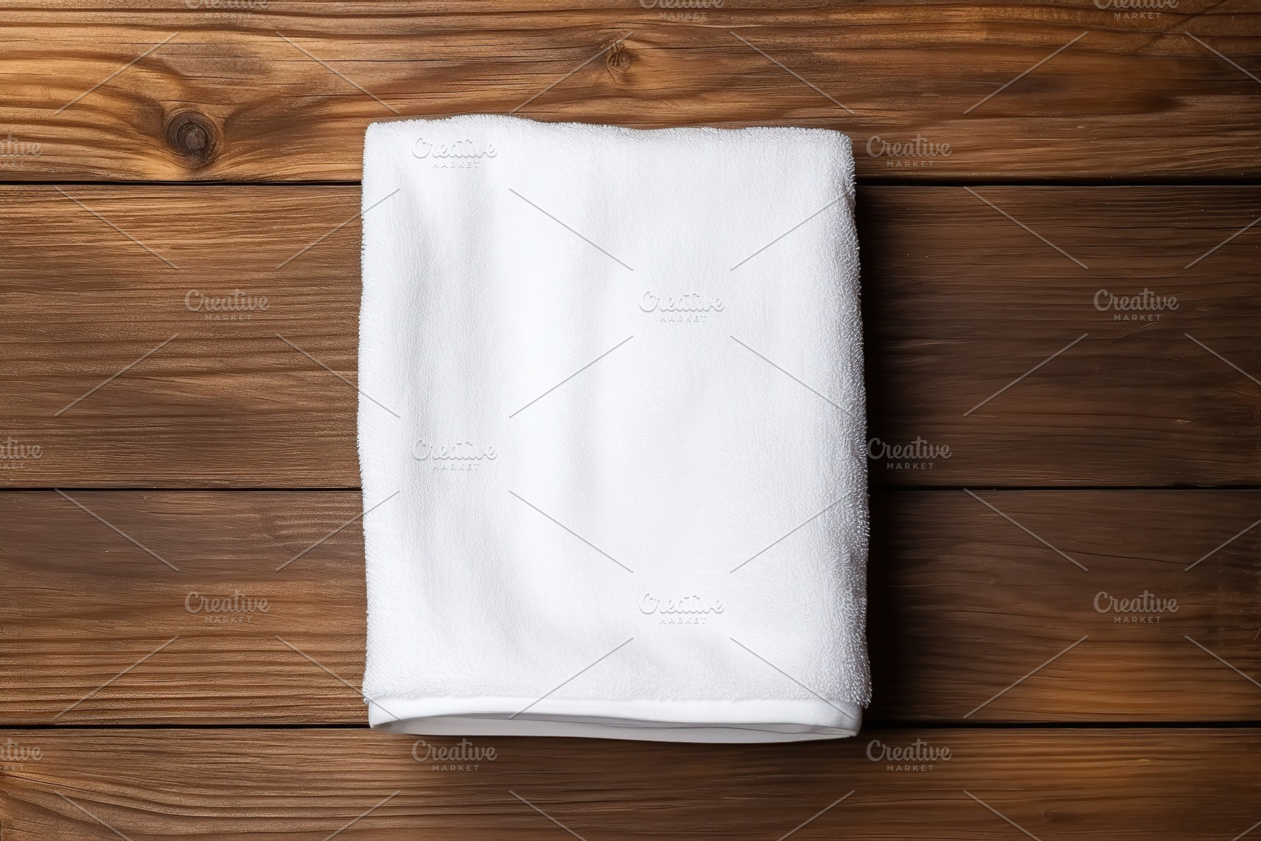 White folded towel on wooden table, a Background Photo by AlyaAnd