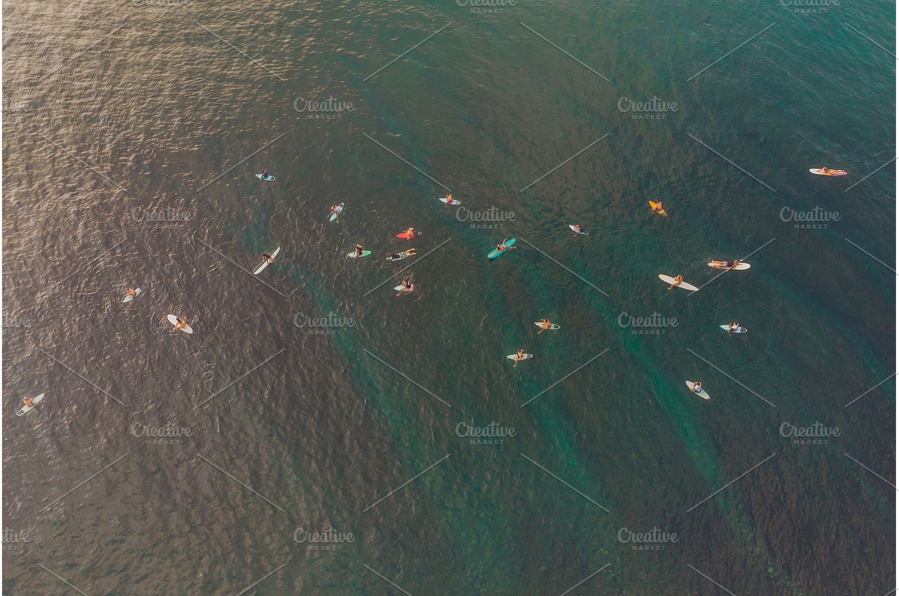 Surfers on the waves in the ocean, a Sports & Recreation Photo by Elizaveta Galitskaya