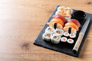 Fresh sushi assortment with salmon maki and nigiri, a Food & Drink Photo by etorres69