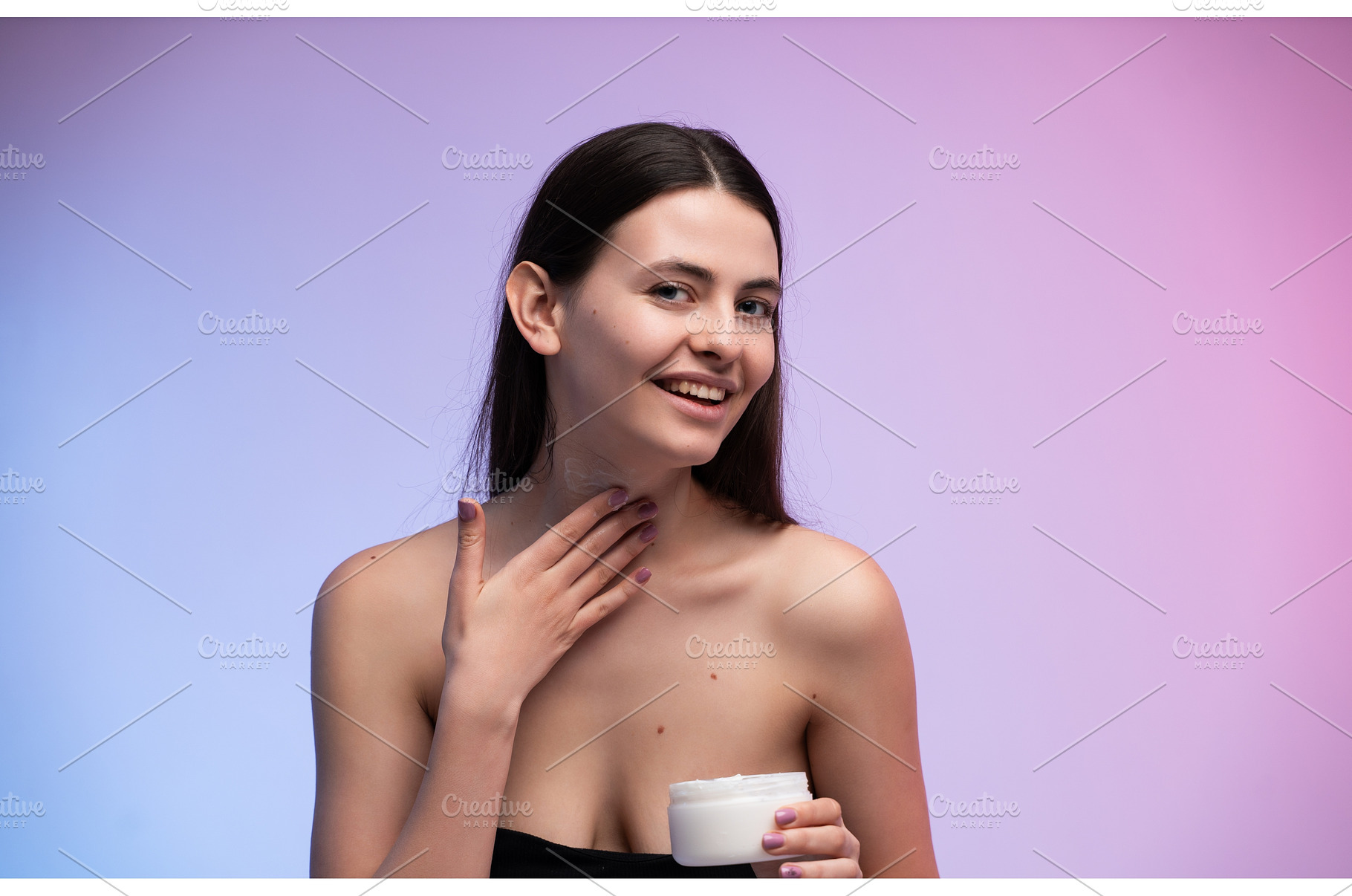 Woman applying moisturizing cream to, a Health & Medical Photo by volodymyrshtun13795
