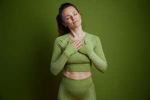 Green Calm: Woman in Meditation, a Person Photo by Alliance Images