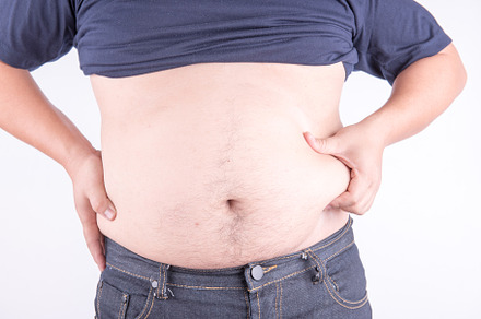 Fat man with belly containing abdomen, adult, and background