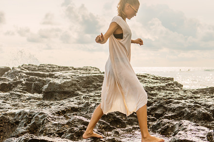 Pretty woman near danger rocks on oc featuring woman, sea, and girl