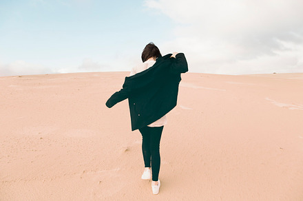 Sand dunes stock photo containing sand dunes and girl walking