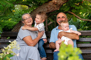 Grandmother hugging grandson, a Person Photo by Elena Vagengeim