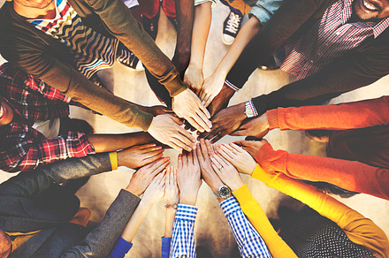 Hands out together containing aerial, african american, and african descent
