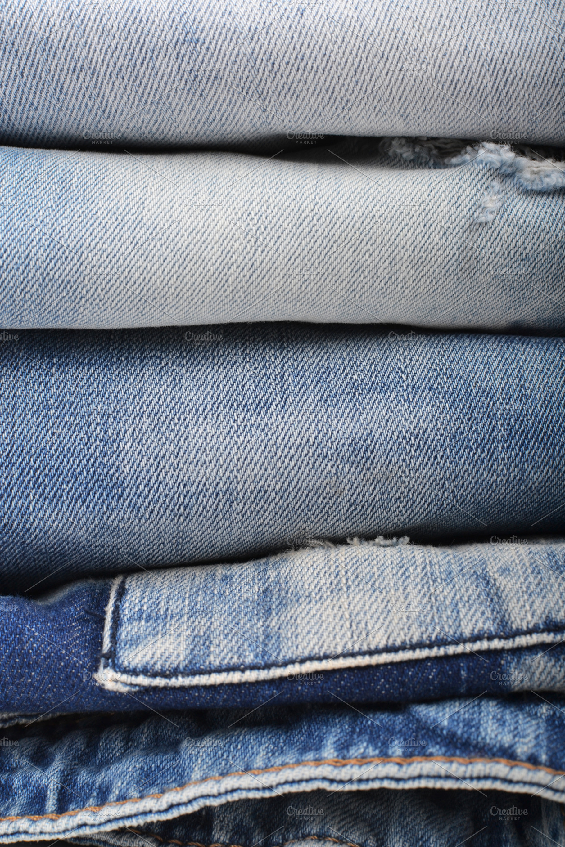 Stack of folded jeans stock photo containing jeans and denim