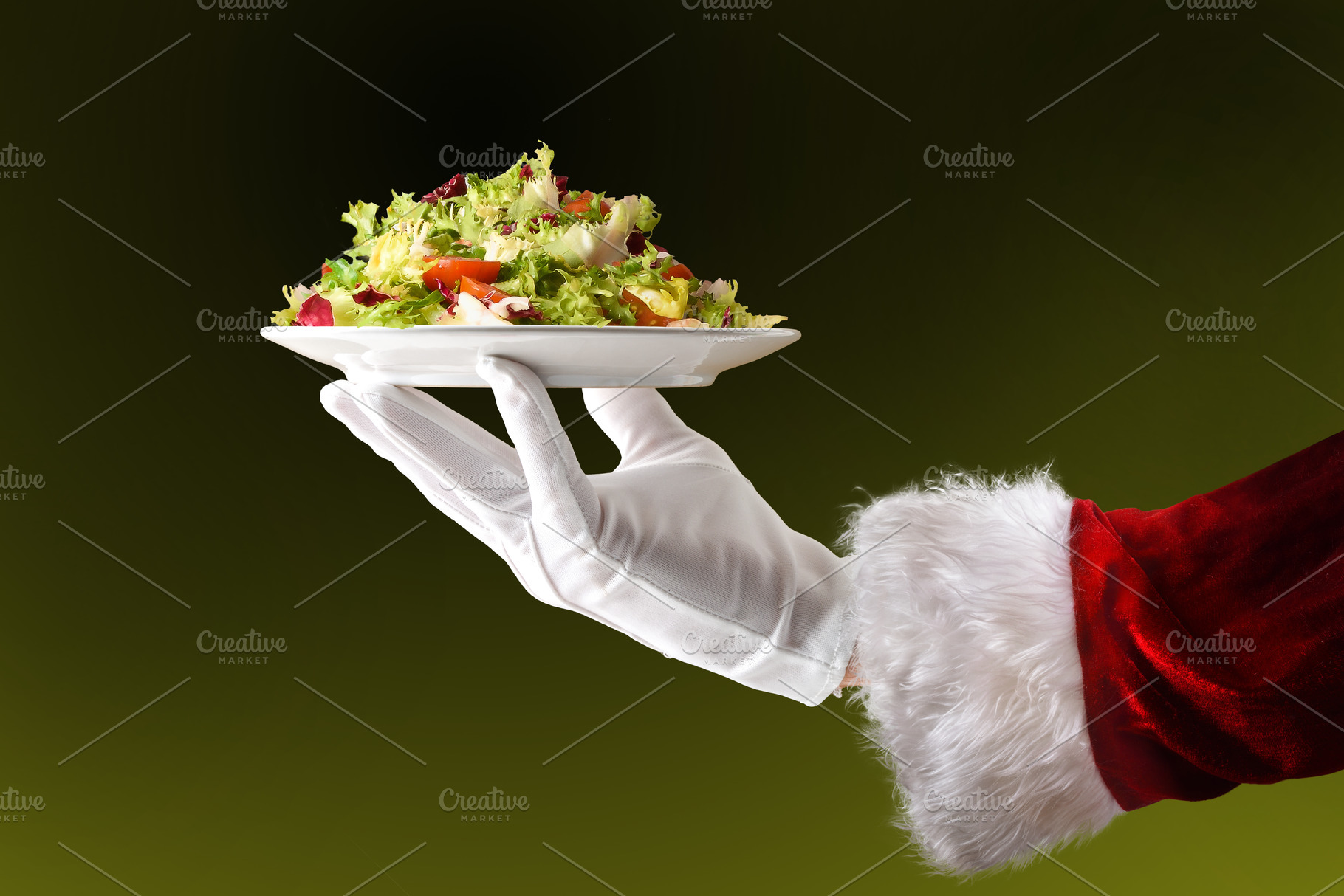 Healthy food concept at Christmas with Santa's holding salad, a Holiday Photo by Davizro's Market