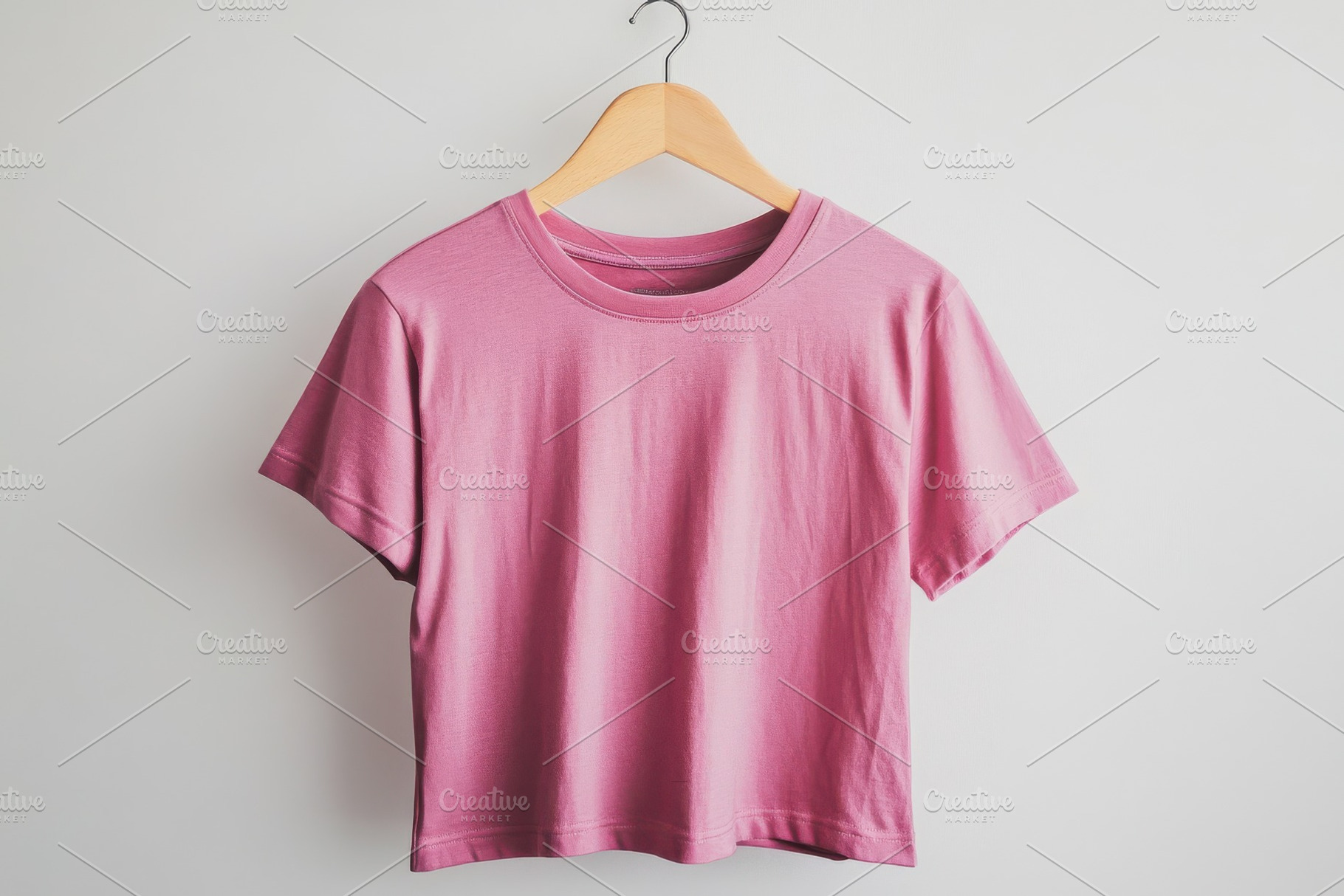 Pink T-shirt on Wooden Hanger Minima, a Beauty & Fashion Photo by Pixeness Studio