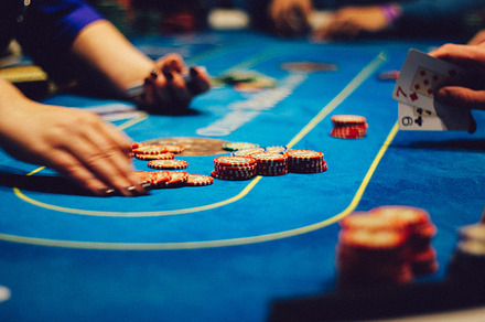 Dealer counts poker chips