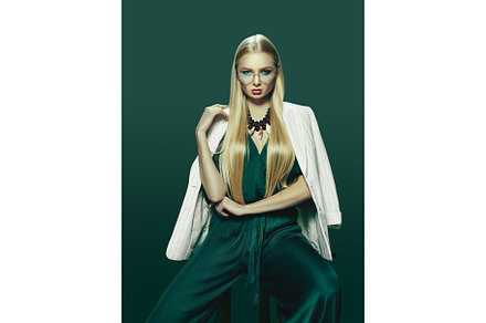 Blonde young woman in elegant green dress containing fashion, model, and, a Beauty & Fashion Photo by Volodymyr Melnyk