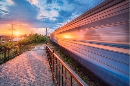 High speed train in motion on the, a Transportation Photo by den-belitsky