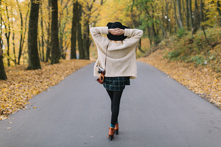 Hippie girl with old camera containing autumn, girl, and park, a Person Photo by Cherkas Photography