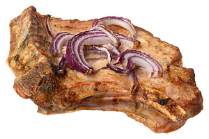 Baked pork entrecote on the bone with a golden crust, seasoned w, a Food & Drink Photo by ndanko