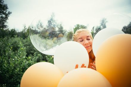 Portrait of young girl with balloons stock photo containing girl and happy