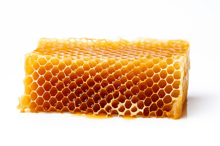 Honeycomb and honey on white background, a Food & Drink Photo by AlyaAnd