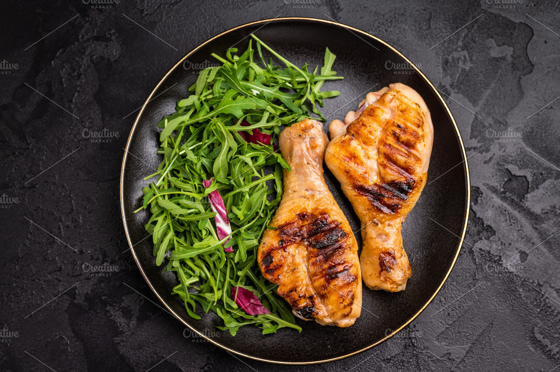 Deliciously grilled chicken legs drumsticks, featuring a crispy, a Food & Drink Photo by composter-box@mail.ru