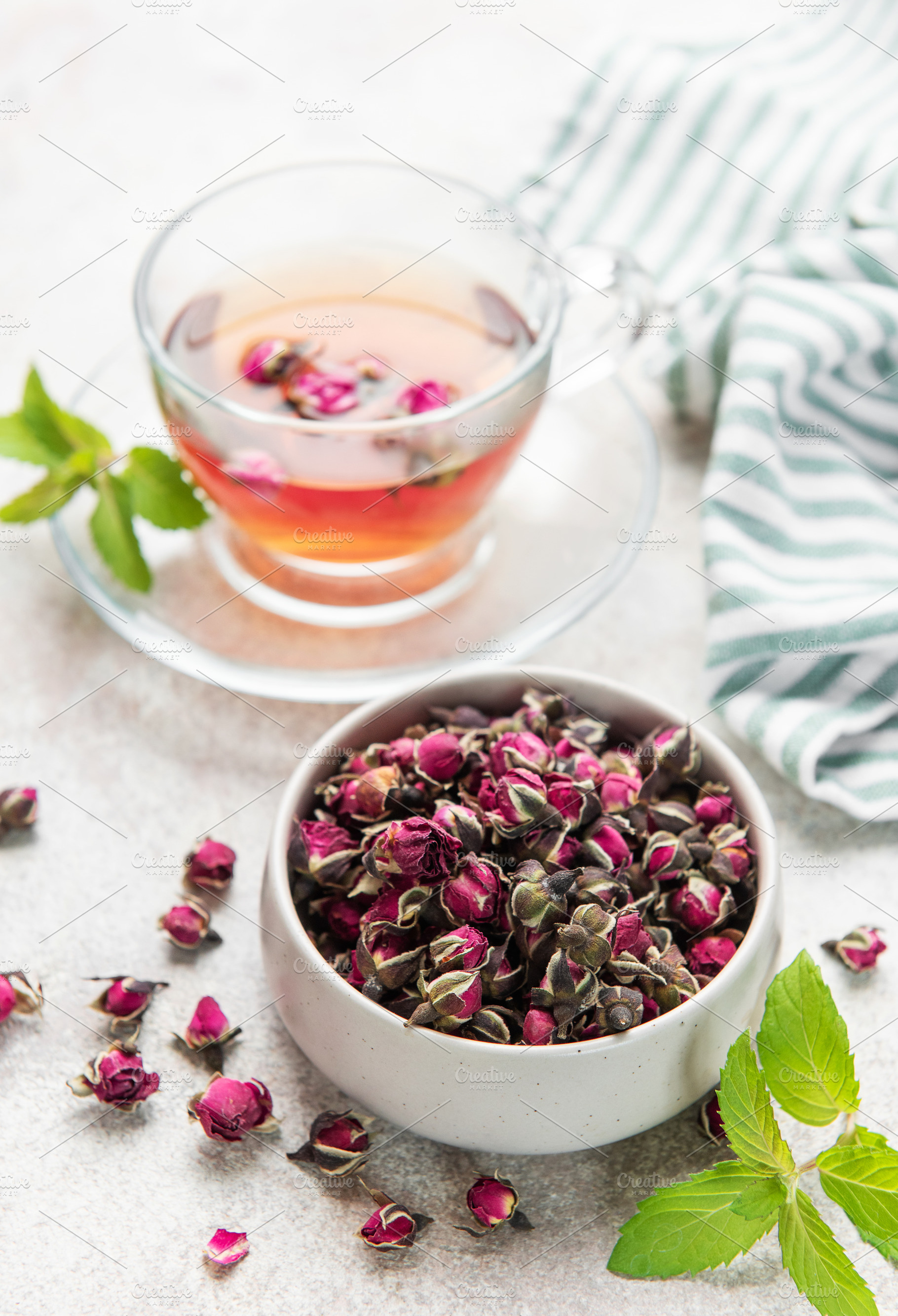 Rosebud herbal tea with dried flowers and mint, a Food & Drink Photo by Olena Rudo