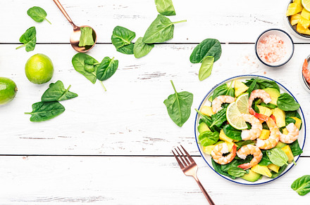 Fresh pineapple shrimp salad with spinach, avocado and lime on w, a Food & Drink Photo by 5PH