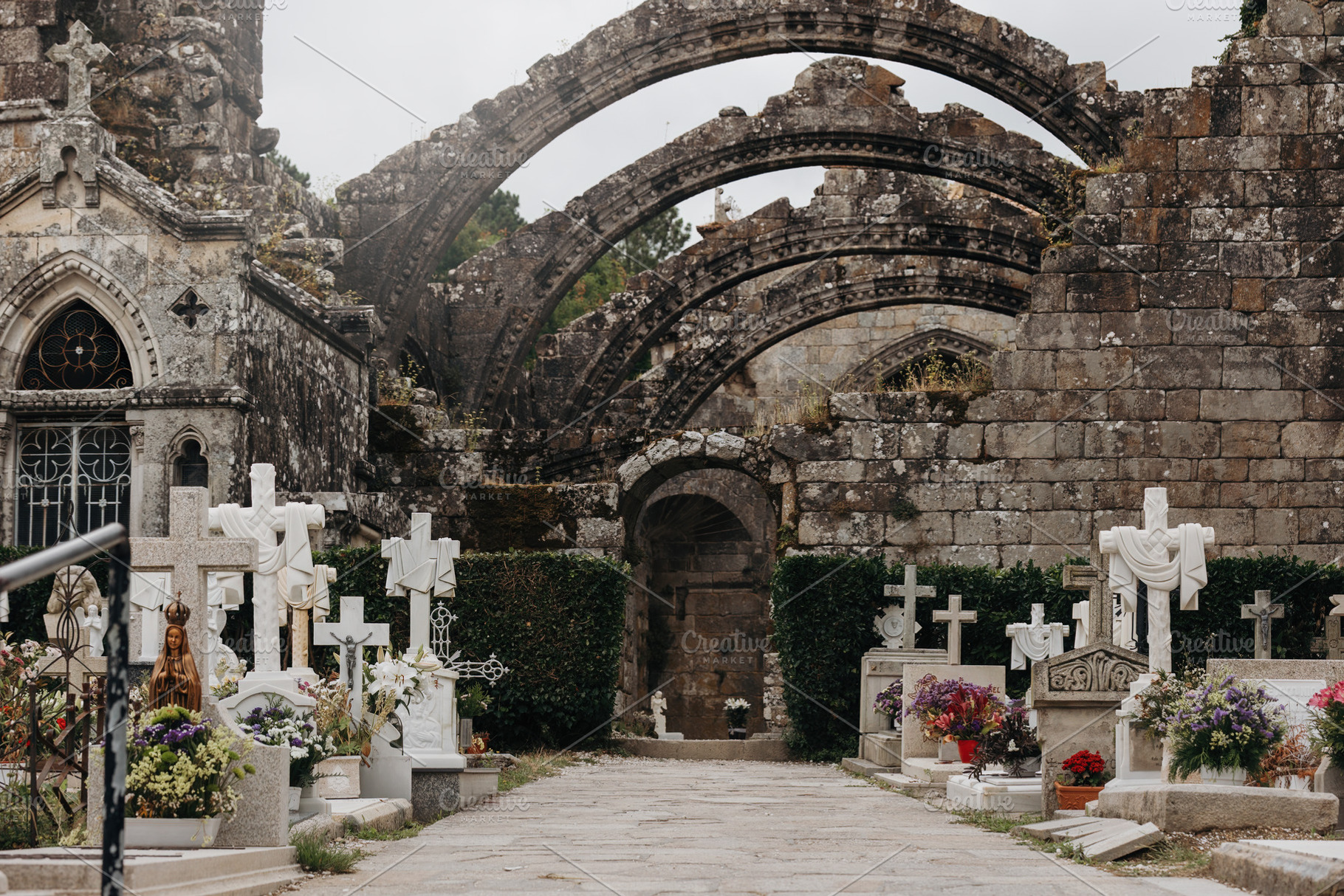 Ancient cemetery in front of medieva, an Architecture Photo by Perpis