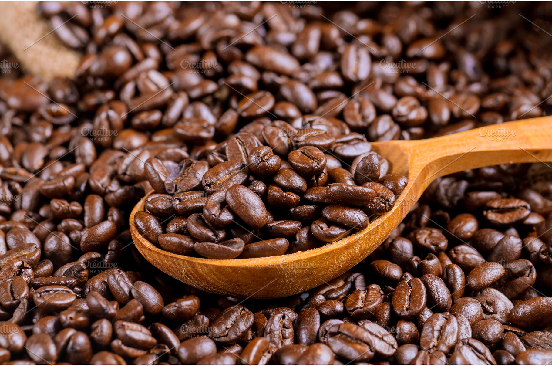 Wooden spoon of coffee beans and bag, a Food & Drink Photo by Ungvar Studio