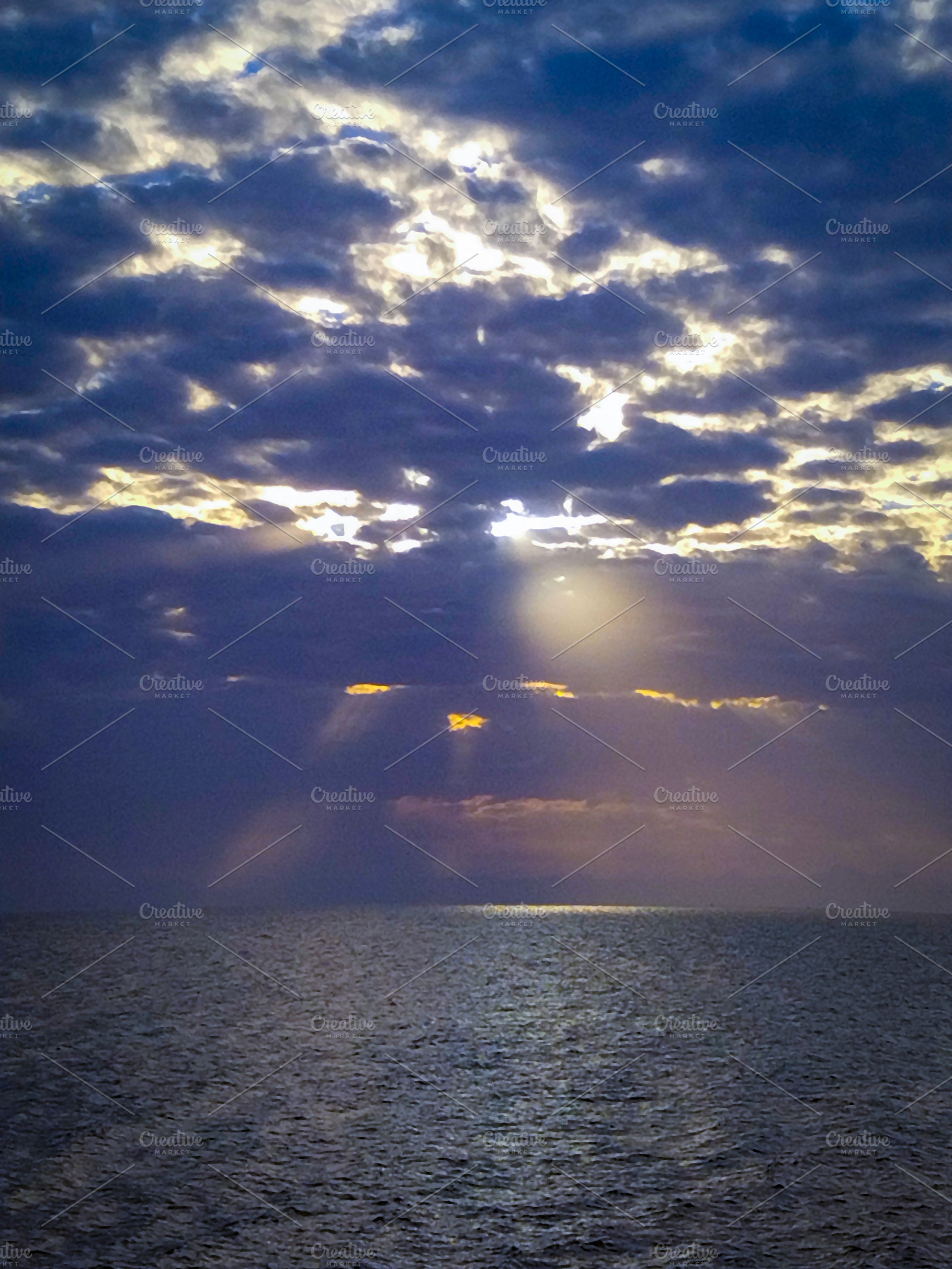 Dramatic cloudscape at sea during sunset, a Nature Photo by DanFLCreativo
