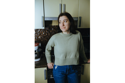Young beautiful modern woman stands, a Person Photo by zheckasmk