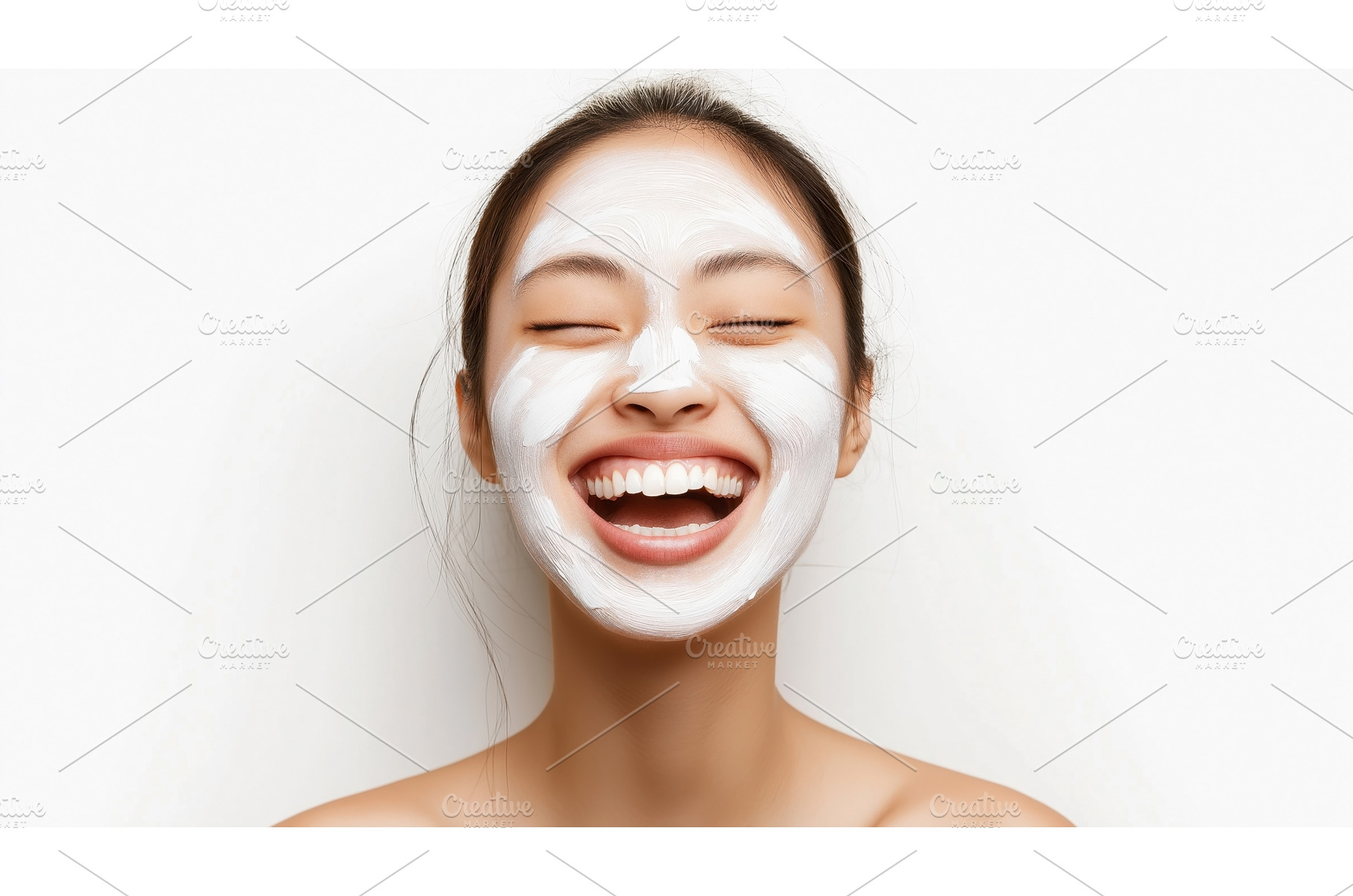 Smiling Asian woman with a facial, a Beauty & Fashion Photo by Sergey Kotenev