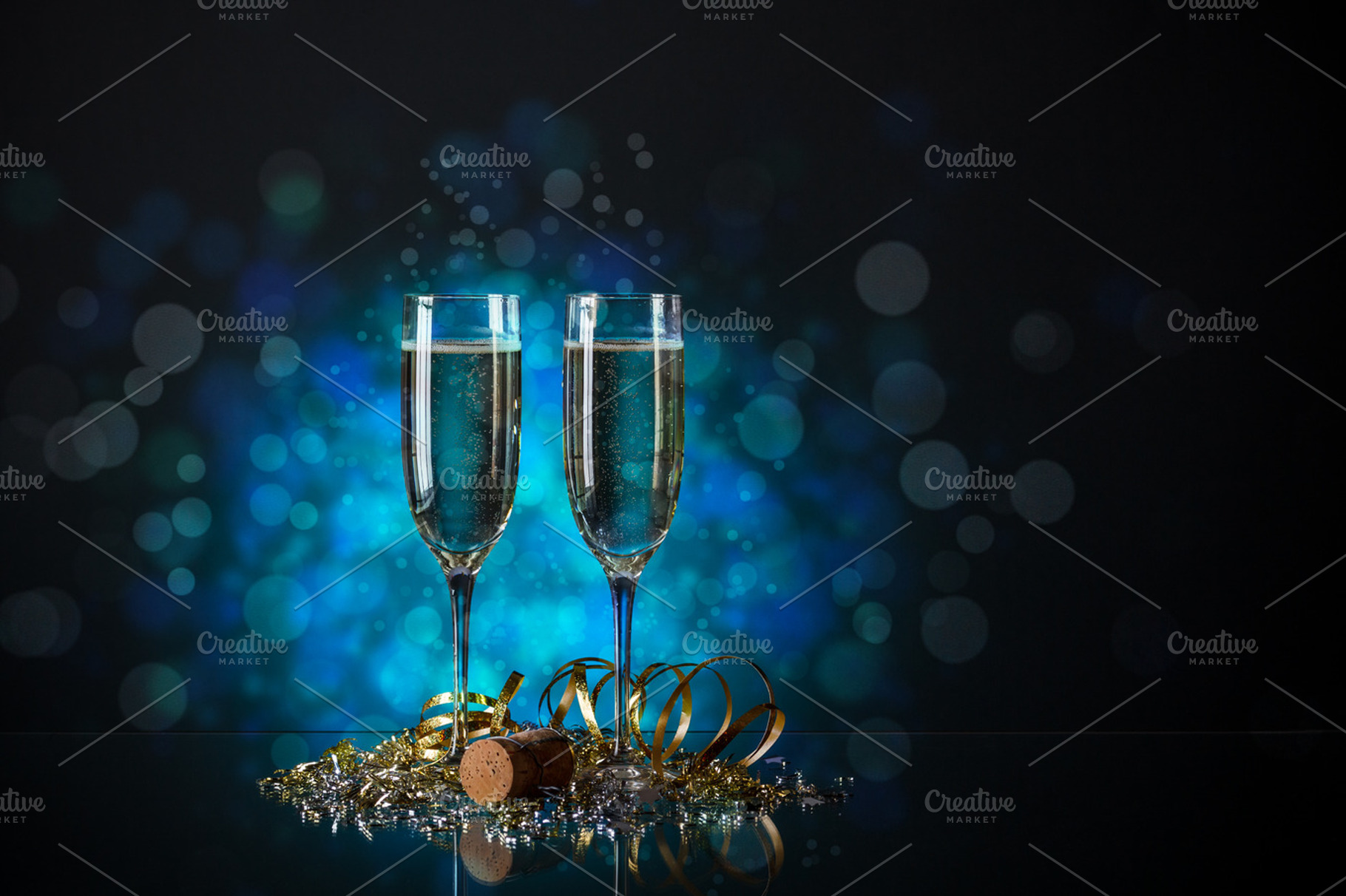 Pair glass of champagne containing new, year, and eve