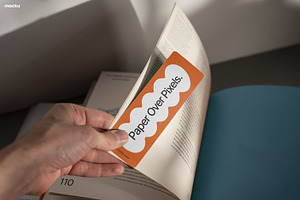 Hand Holding Bookmark Mockup