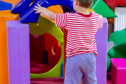 boy playing with building toy blocks