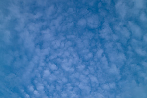 Summer blue sky with white light clo featuring cloud, blue, and white