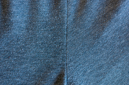 Difference, before and after, lint removal treatment from fabric, an Industrial Photo by Antonio Gravante Market