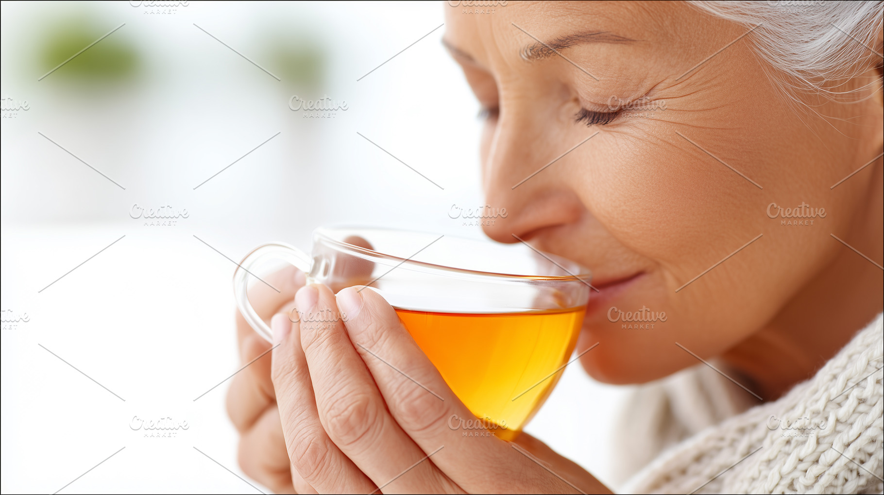 Peaceful senior woman enjoying a tea, a Food & Drink Photo by MistyDay