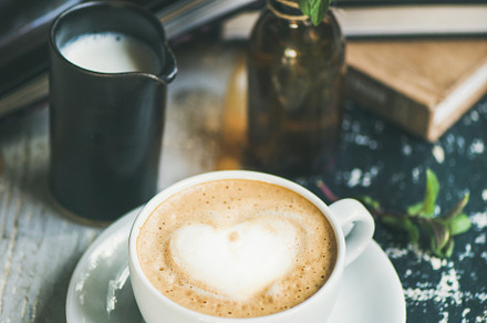 Classic foamy cappuccino coffee, a Food & Drink Photo by Foxys