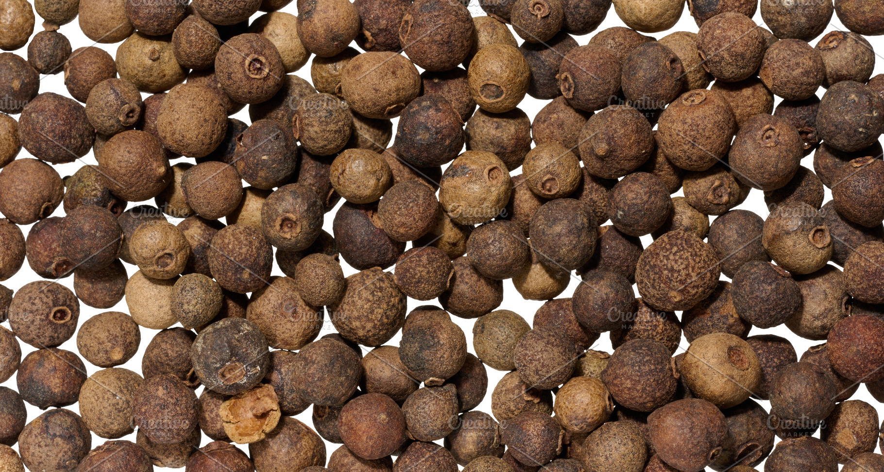 Scattered allspice, spice. Full frame, a Food & Drink Photo by ndanko