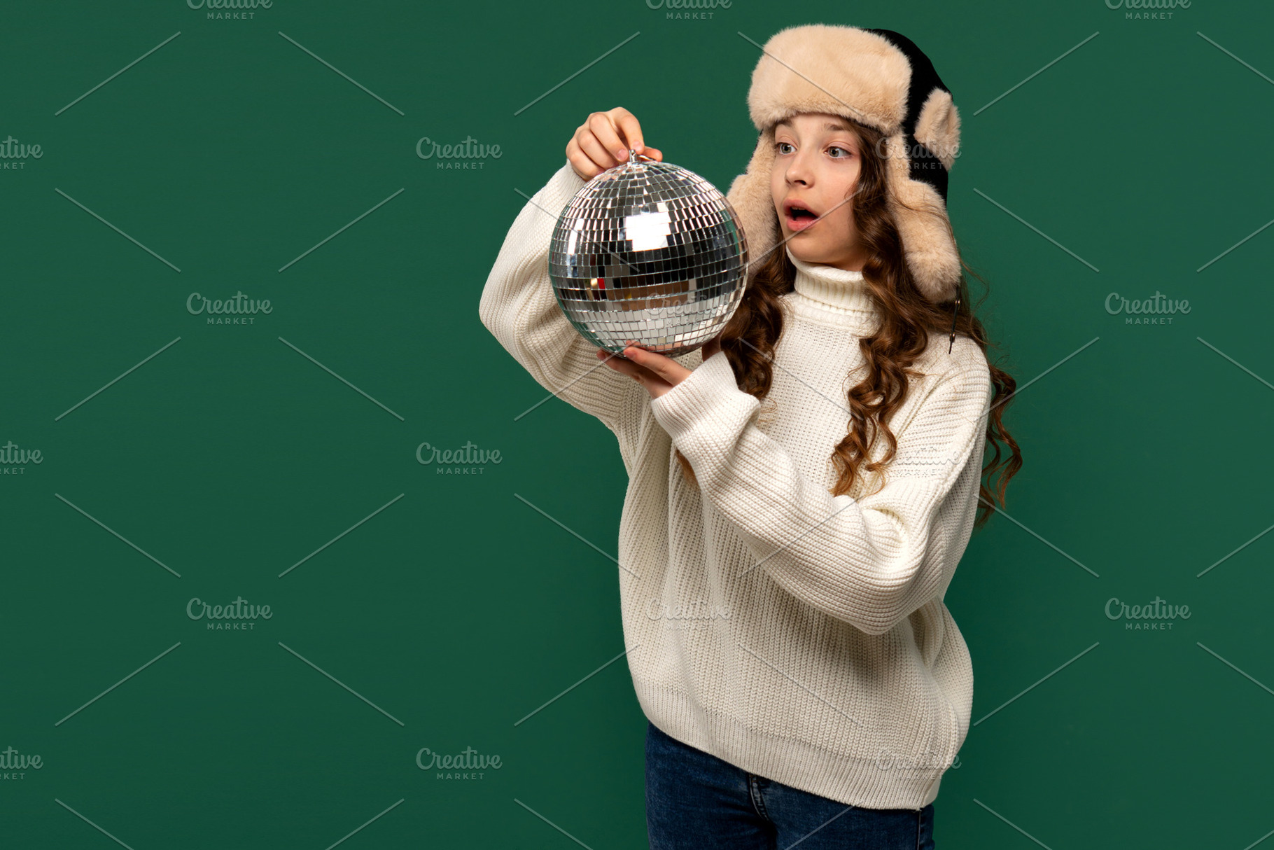 Surprised girl in winter hat looking, a Person Photo by Elena Vagengeim