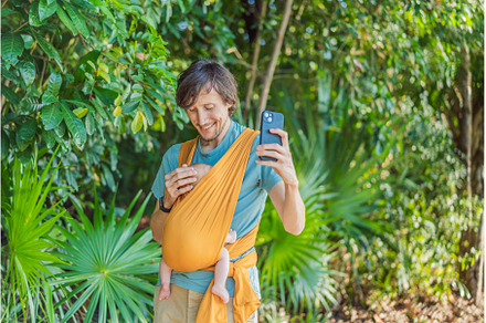 Father holding his little baby in a
