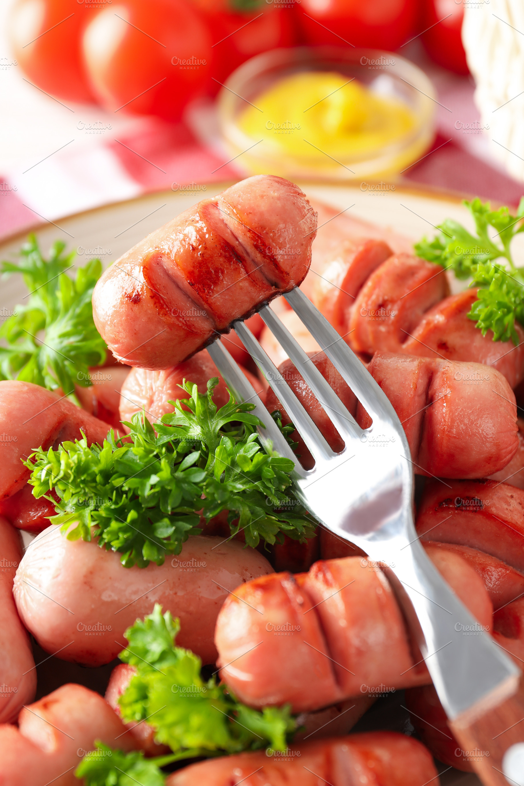 Concept of tasty food, grilled mini sausage, close up, a Food & Drink Photo by AtlasStudio PRO