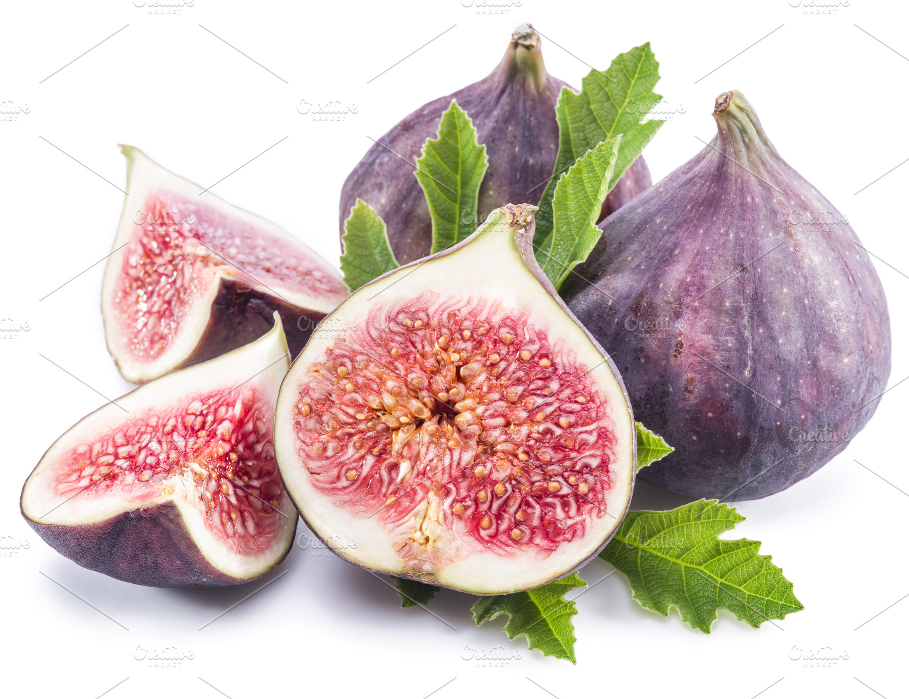 Ripe fig fruits on the white background., a Food & Drink Photo by Volff