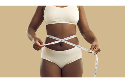 Black woman in underwear measure, a Sports & Recreation Photo by StudioRomantic