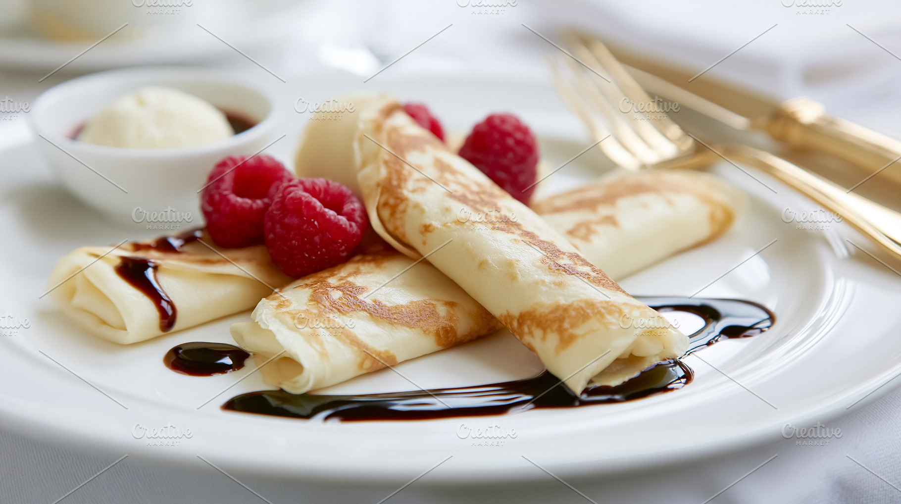 Dessert crepes creating a sweet and indulgent treat, perfect for breakfast, bru, a Photo by Studio ANNA