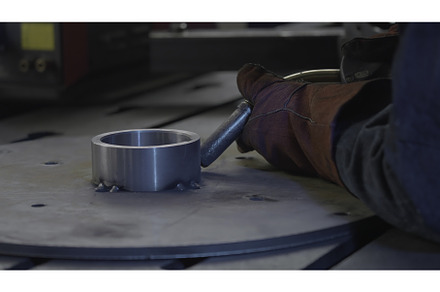 Welder in gloves holds welding with, an Industrial Photo by Media Whale Stock